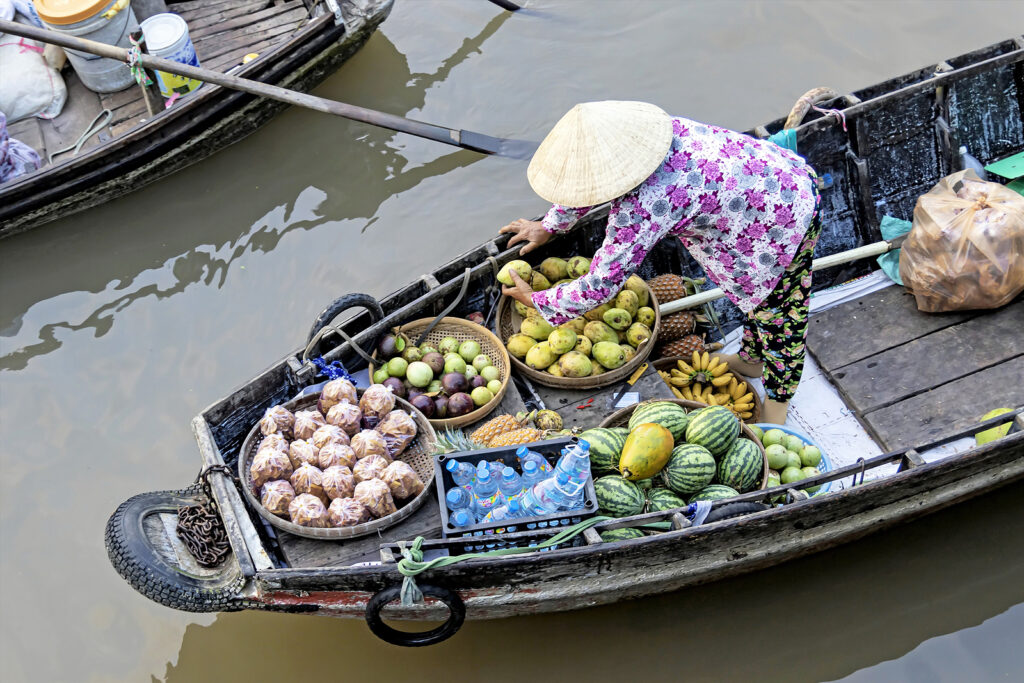 Phan Thiet, Vietnam – July 12th, 2020. Greengrocer On Wooden Flo