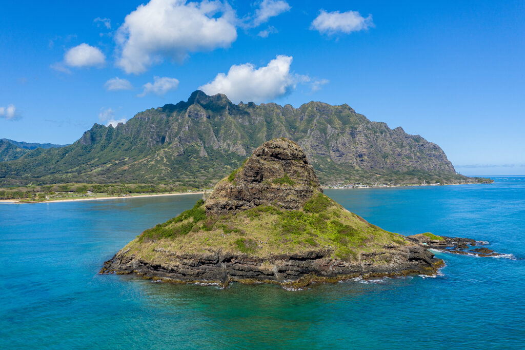 Aerial View Of The Chinamans Hat With Kualoa Beach And Park With